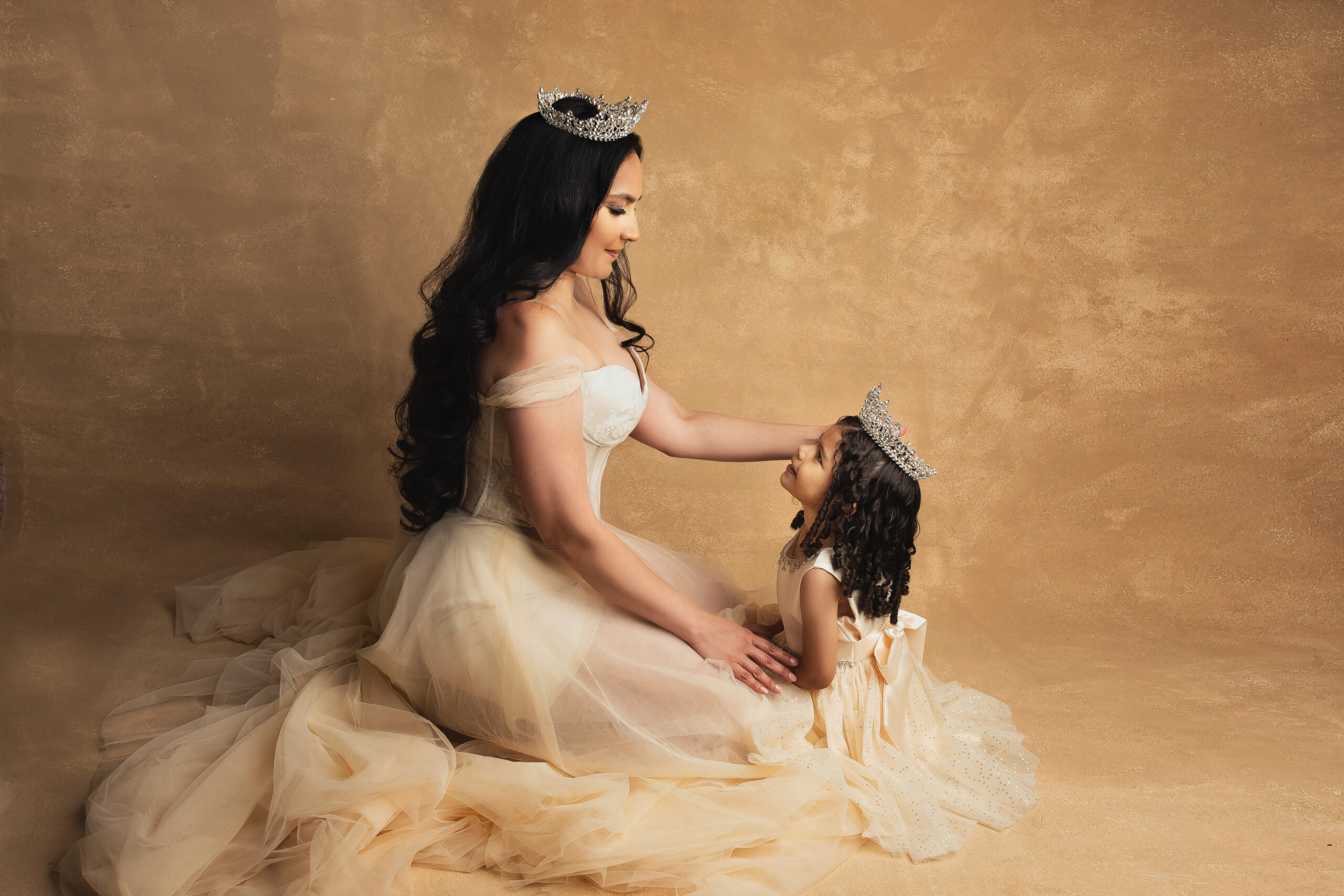 Fine art portrait with neutral tones and princess dress and crown taken by child photographer in Texas, Giselle Salazar